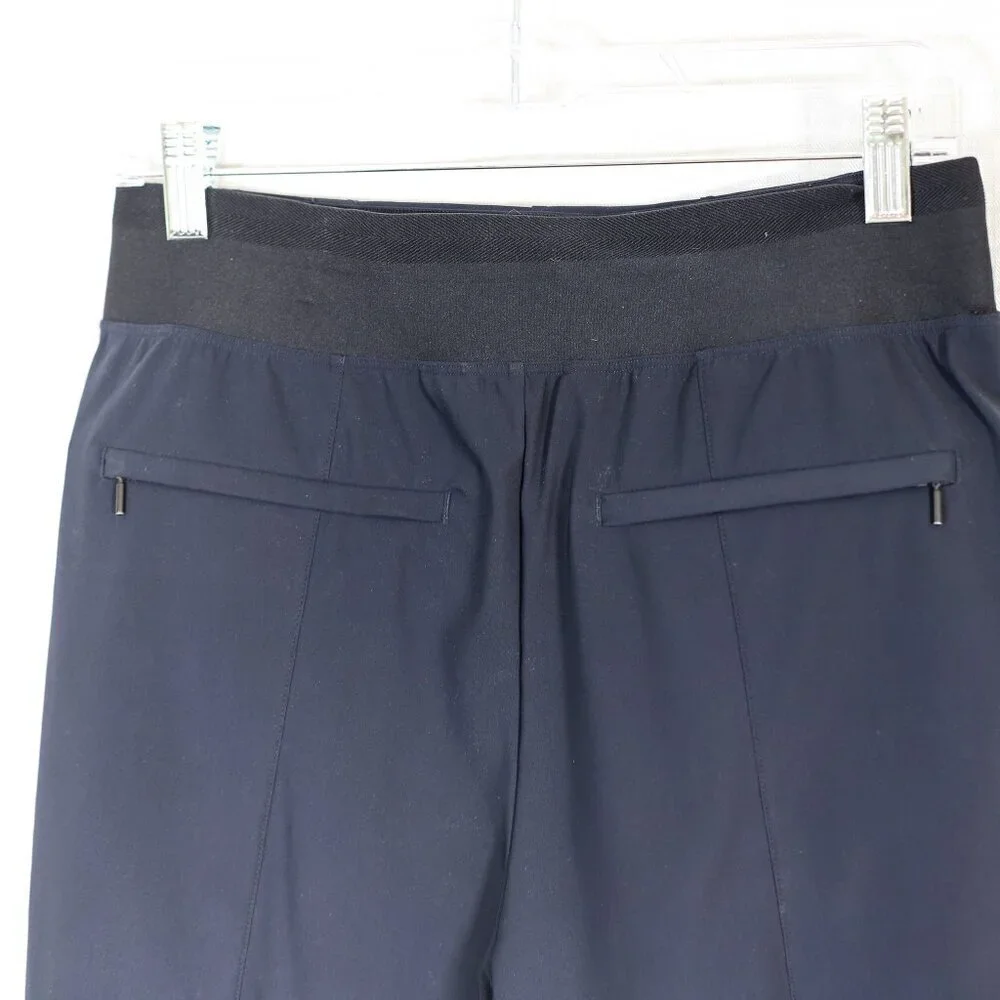 Athleta Size 8 dark blue Cosmic Bermuda stretch zip pockets shorts no size tag